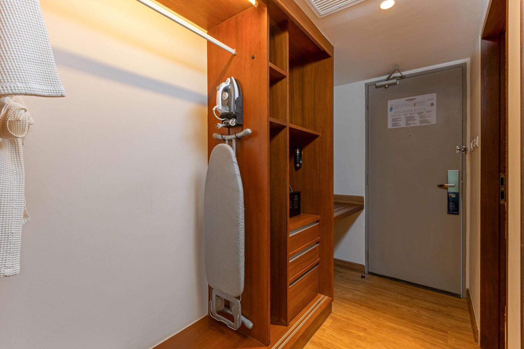 Outrigger Khao Lak Beach Resort - Sha Extra Plus 외부 사진 A steam iron and ironing board in a hotel room